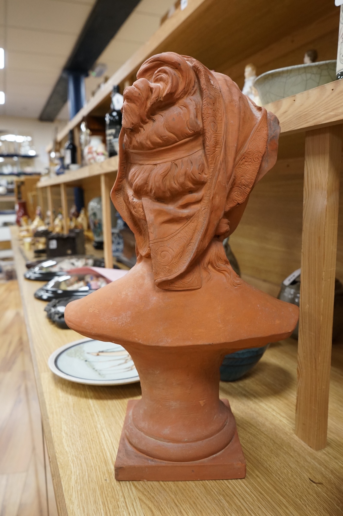 A Bretby classical terracotta bust, 51cm